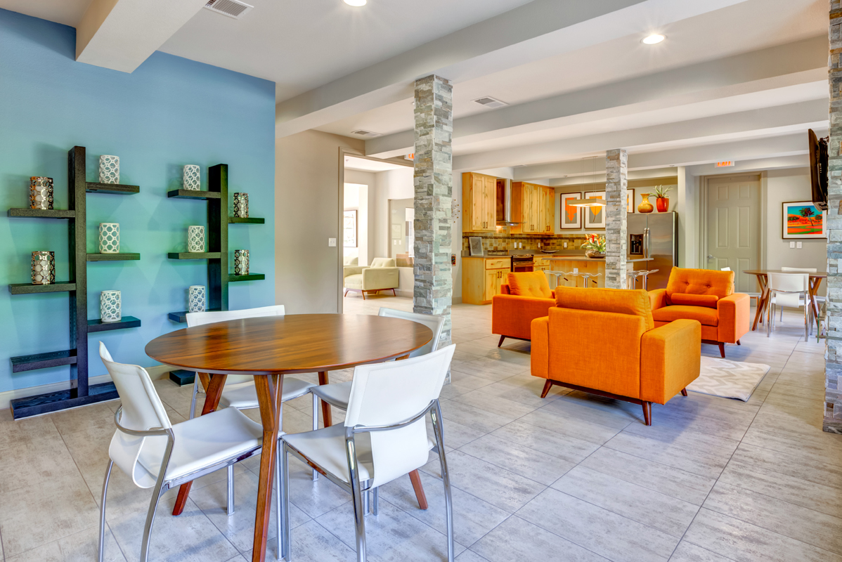Community dining area overlooking community lounge and community kitchen