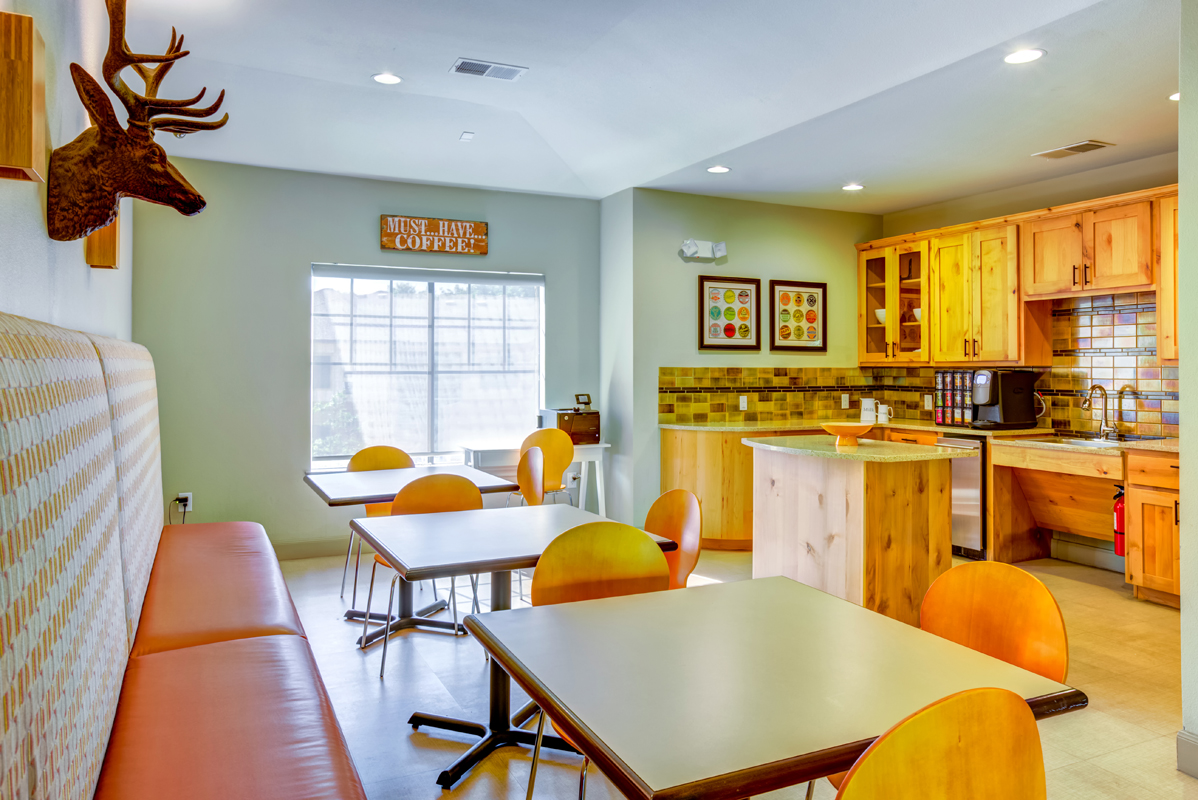 Community kitchen with free coffee and booth style seating